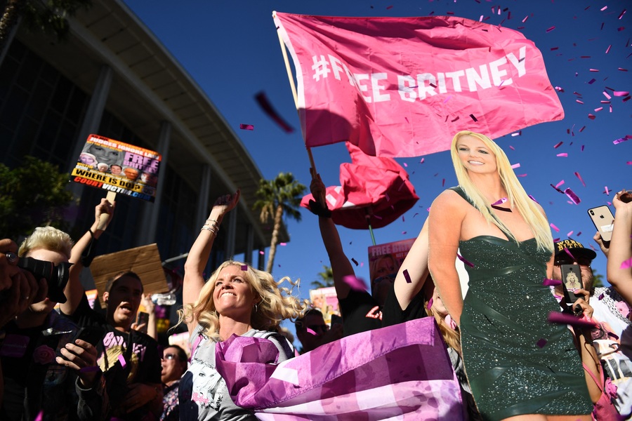 Supporters of the FreeBritney movement rally in support of musician Britney Spears for a conservatorship court hearing,  outside the Stanley Mosk courthouse in Los Angeles, California on November 12, 2021. A Los Angeles judge on Friday formally appro